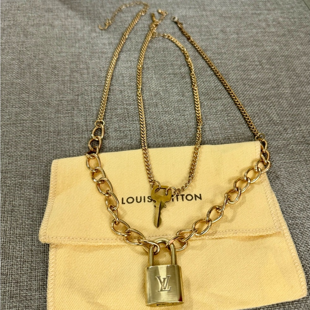 Louis Vuitton Padlock and key with 2 gold finish necklaces